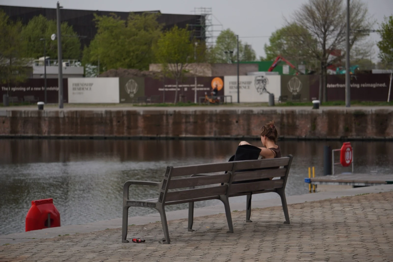 One person and a bag by the waterfront