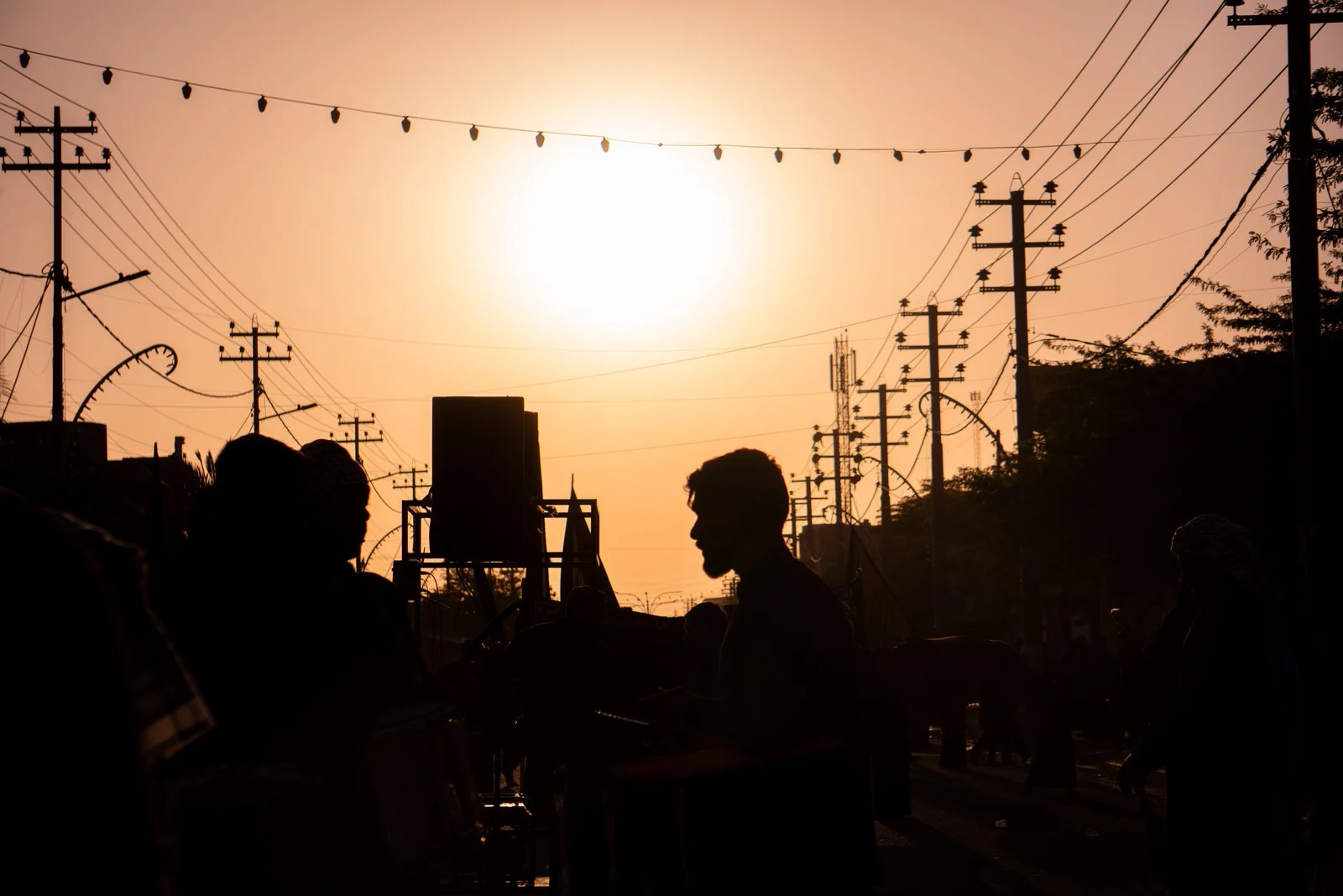 Backlit street silhouettes