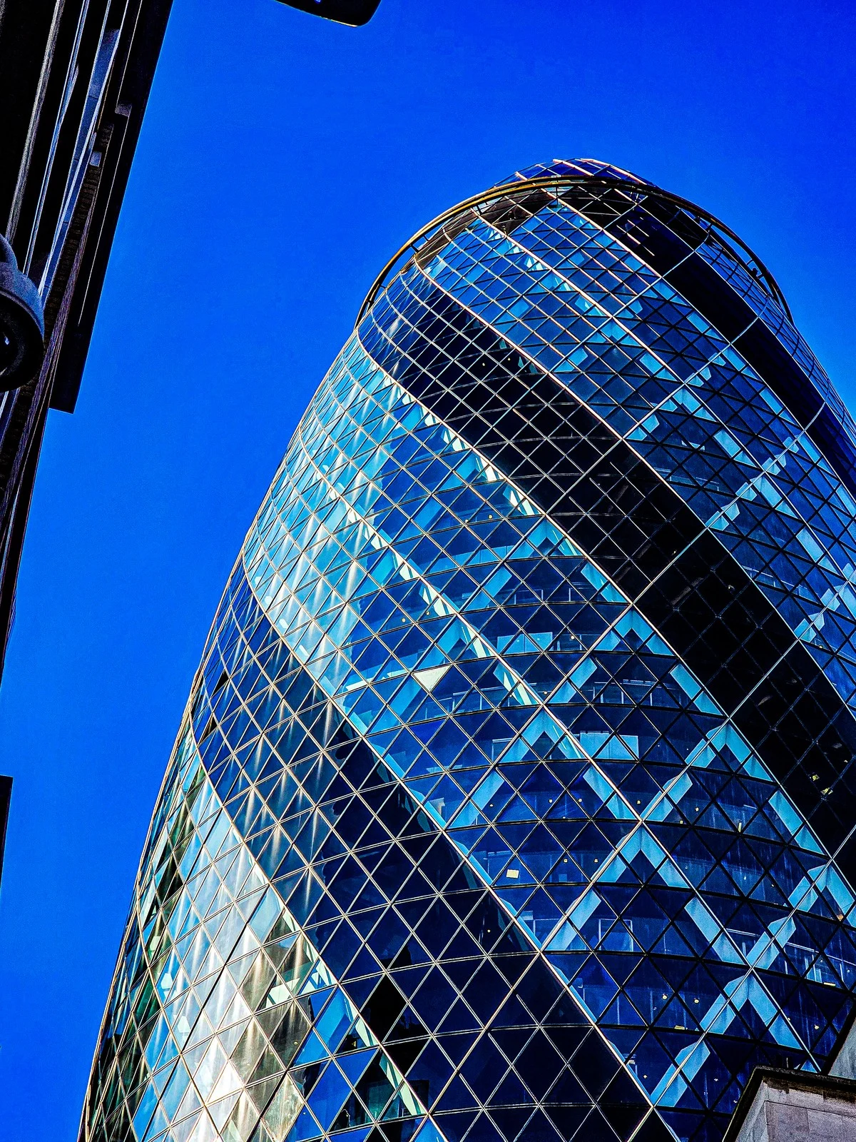 Curved glass against blue